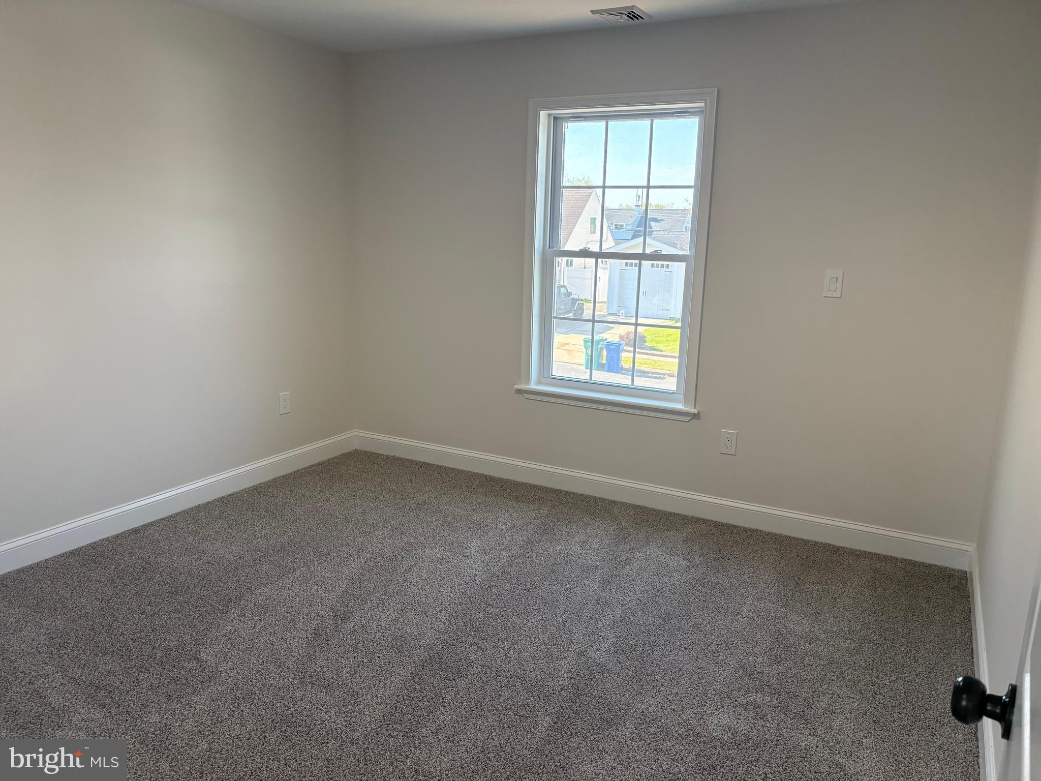 50 Micahill Road Levittown, PA 19056 - Photo 33 of 45 an empty room with a window