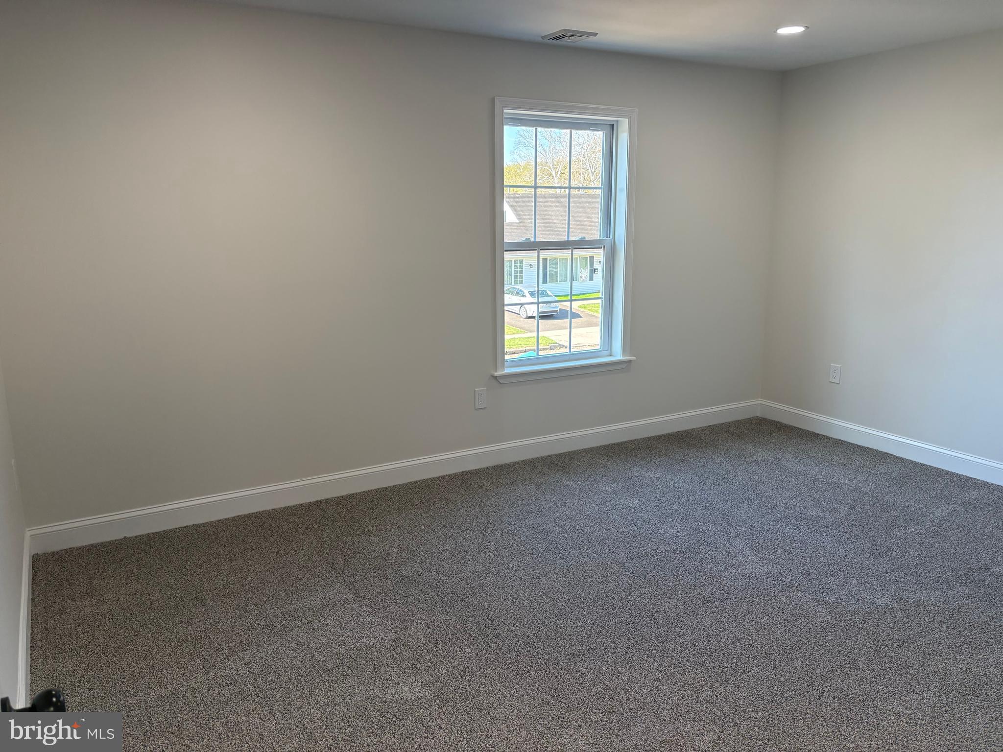 50 Micahill Road Levittown, PA 19056 - Photo 36 of 45 an empty room with a window