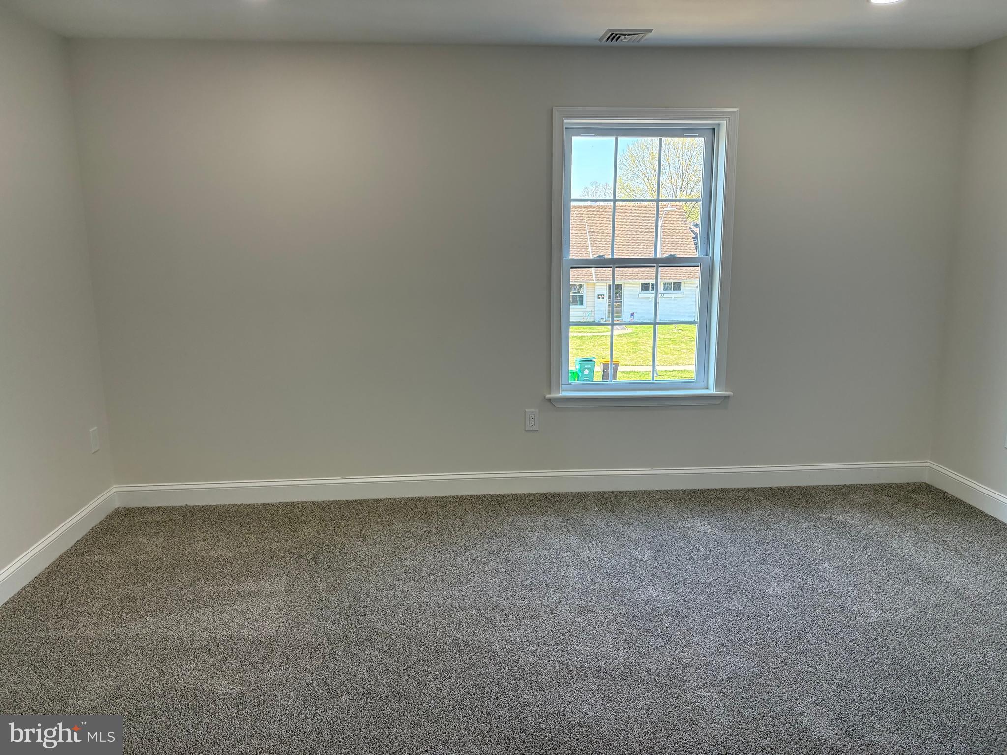 50 Micahill Road Levittown, PA 19056 - Photo 37 of 45 an empty room with a window