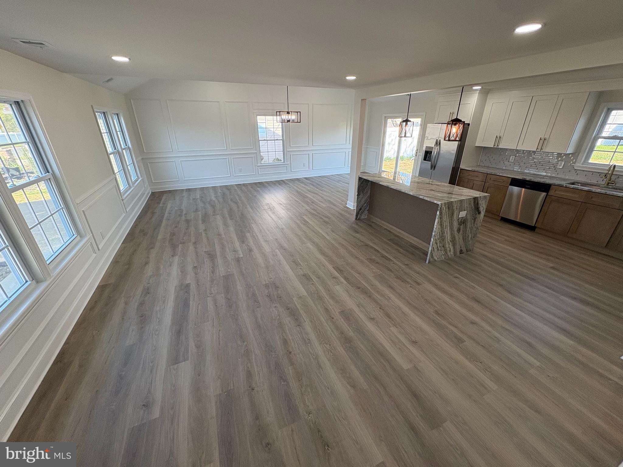 50 Micahill Road Levittown, PA 19056 - Photo 8 of 45 wooden floor in an empty room with a window