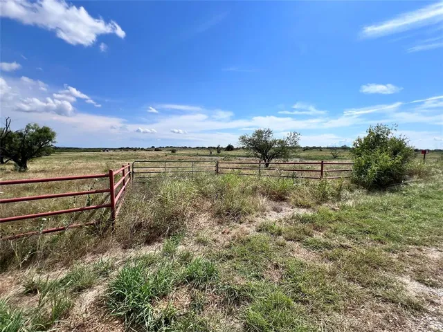 a picture of a bathroom with a shower