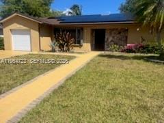 11041 Southwest 166th Terrace Miami, FL 33157 - Photo 2 of 26 a view of a house with outdoor space