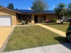 11041 Southwest 166th Terrace Miami, FL 33157 - Photo 4 of 26 a view of a backyard with patio