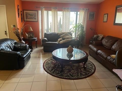 11041 Southwest 166th Terrace Miami, FL 33157 - Photo 6 of 26 a living room with furniture and a potted plant