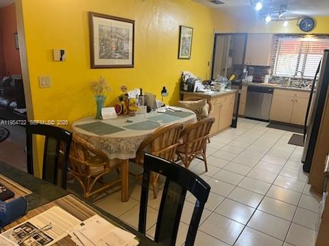 11041 Southwest 166th Terrace Miami, FL 33157 - Photo 10 of 26 a view of a dining room with furniture