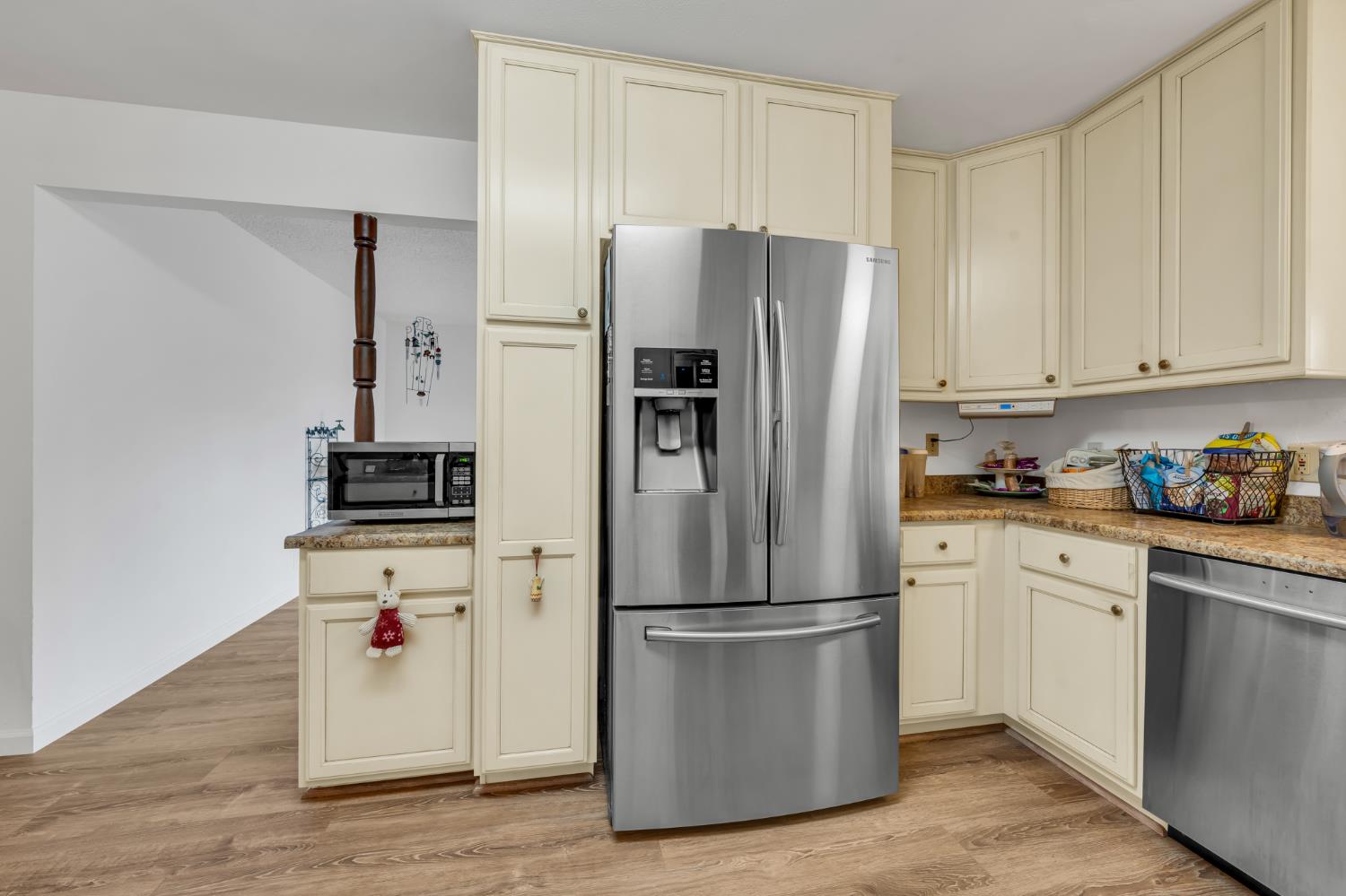 3307 Seaborg Way Sacramento, CA 95827 - Photo 11 of 45 a kitchen with stainless steel appliances a refrigerator and a stove top oven