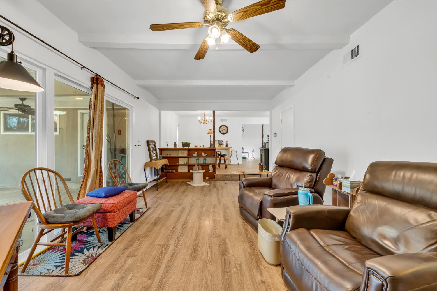 3307 Seaborg Way Sacramento, CA 95827 - Photo 20 of 45 a living room with furniture a ceiling fan and a rug
