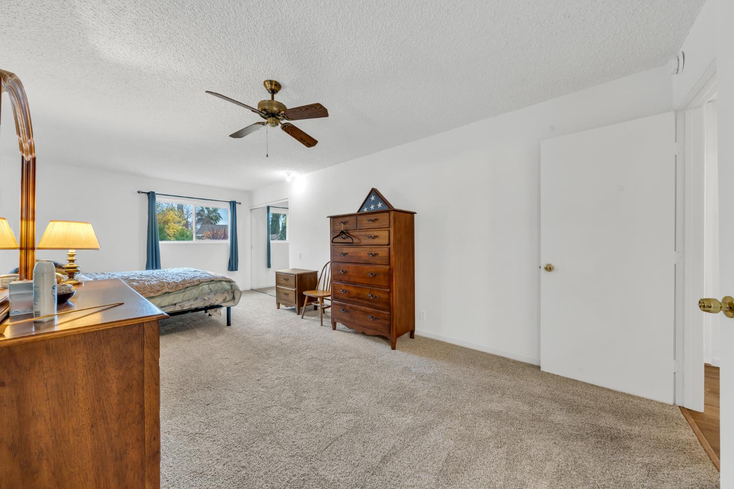 3307 Seaborg Way Sacramento, CA 95827 - Photo 26 of 45 a view of a livingroom with furniture and a ceiling fan