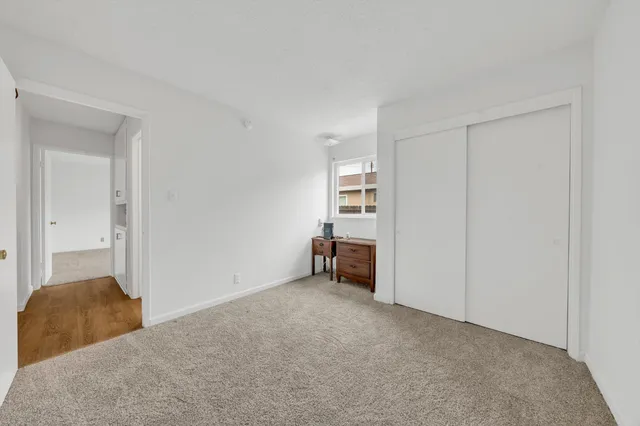 a view of a bedroom with closet