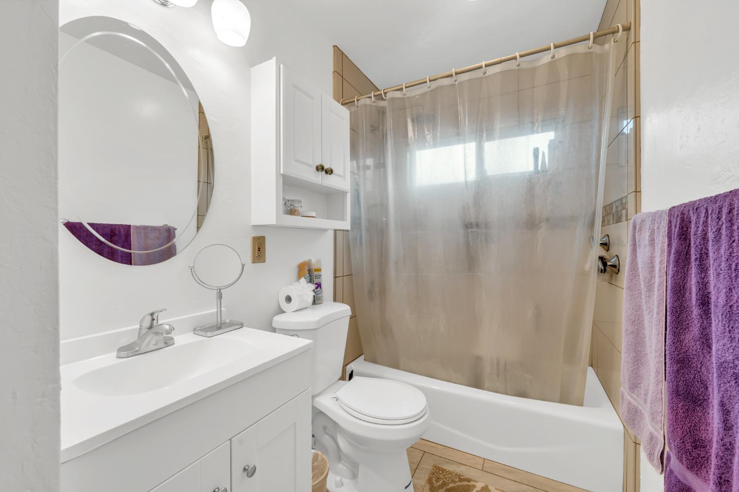 3307 Seaborg Way Sacramento, CA 95827 - Photo 32 of 45 a bathroom with a sink toilet and shower