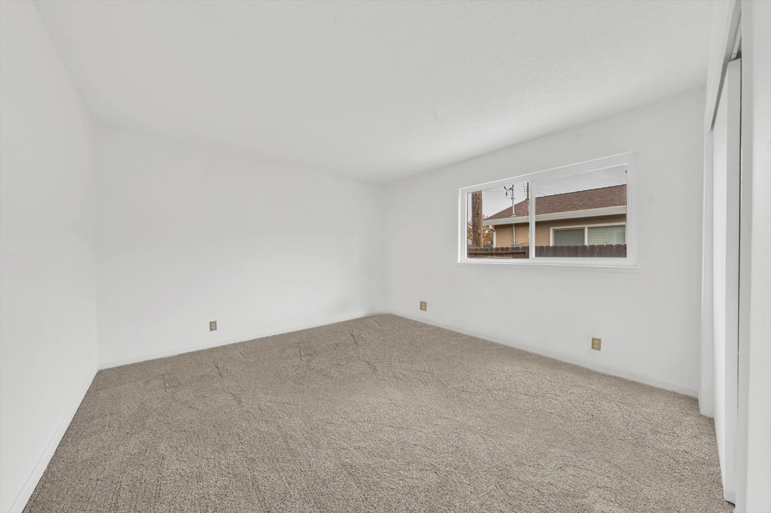 3307 Seaborg Way Sacramento, CA 95827 - Photo 33 of 45 an empty room with windows