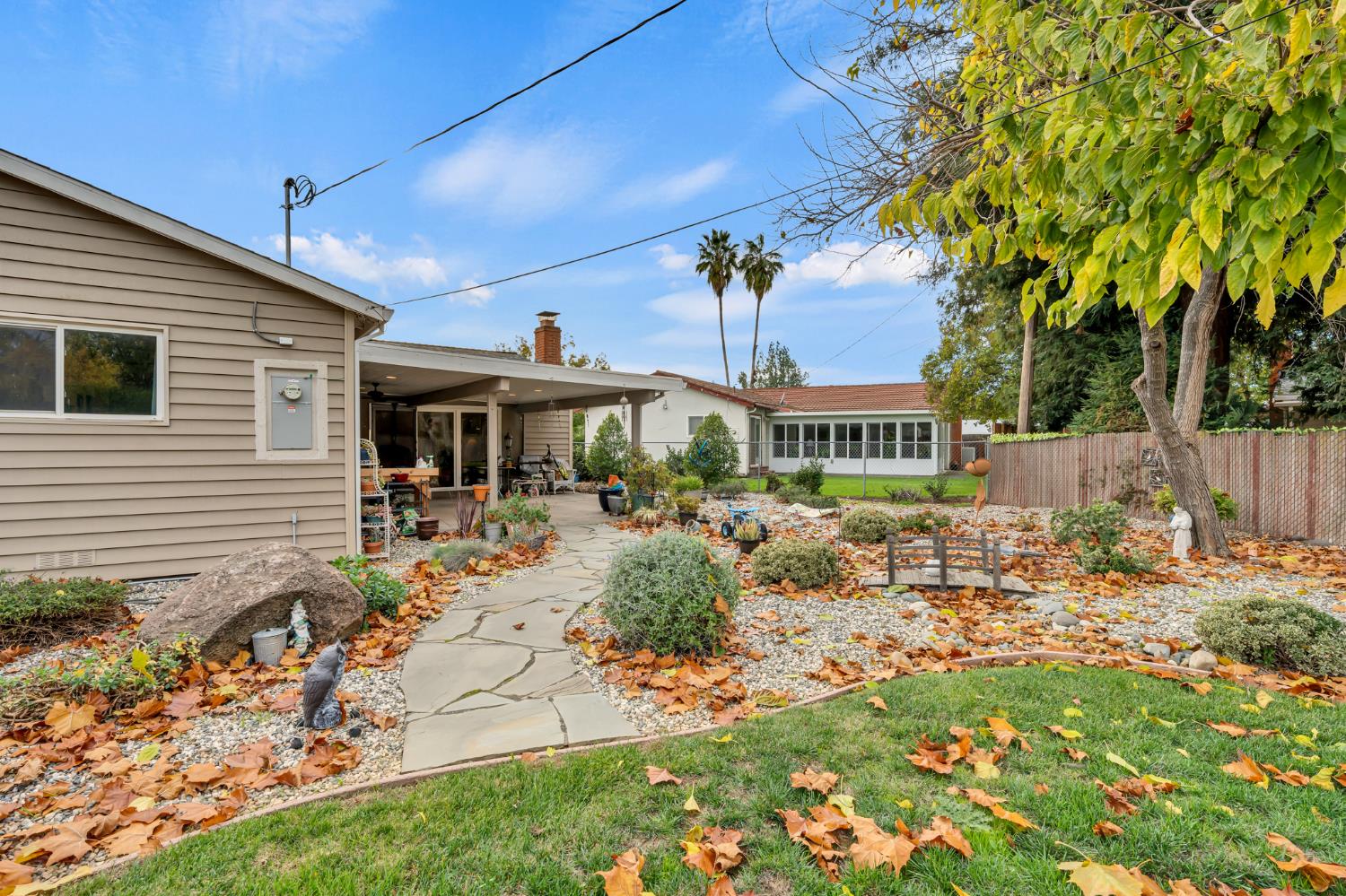 3307 Seaborg Way Sacramento, CA 95827 - Photo 44 of 45 a view of a house with backyard sitting area and garden