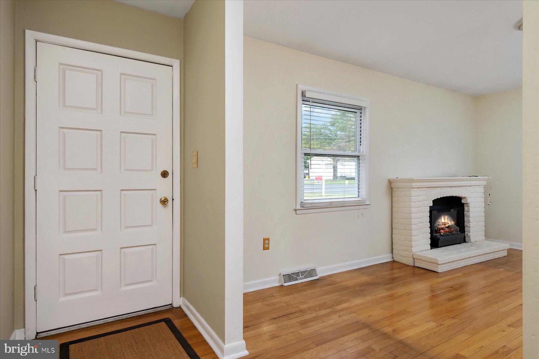 793 Elmhurst Road Severn, MD 21144 - Photo 2 of 39 Front door entry to foyer and Living Room
