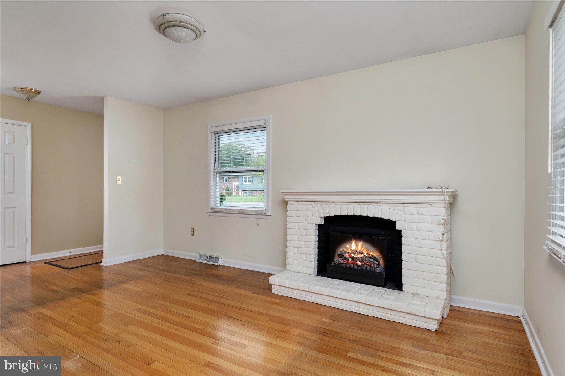 793 Elmhurst Road Severn, MD 21144 - Photo 3 of 39 Living Room with electric fireplace