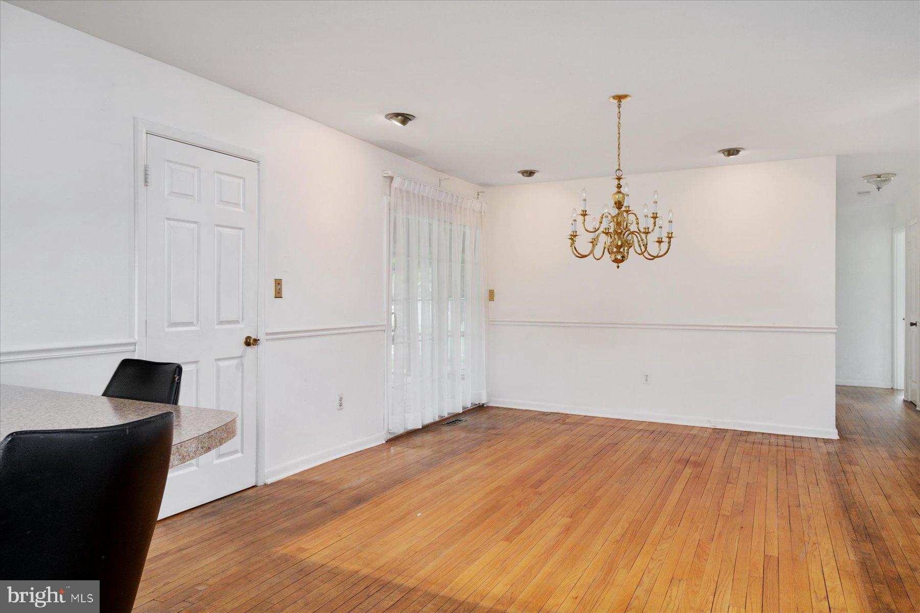 793 Elmhurst Road Severn, MD 21144 - Photo 7 of 39 Dining Room open to back patio