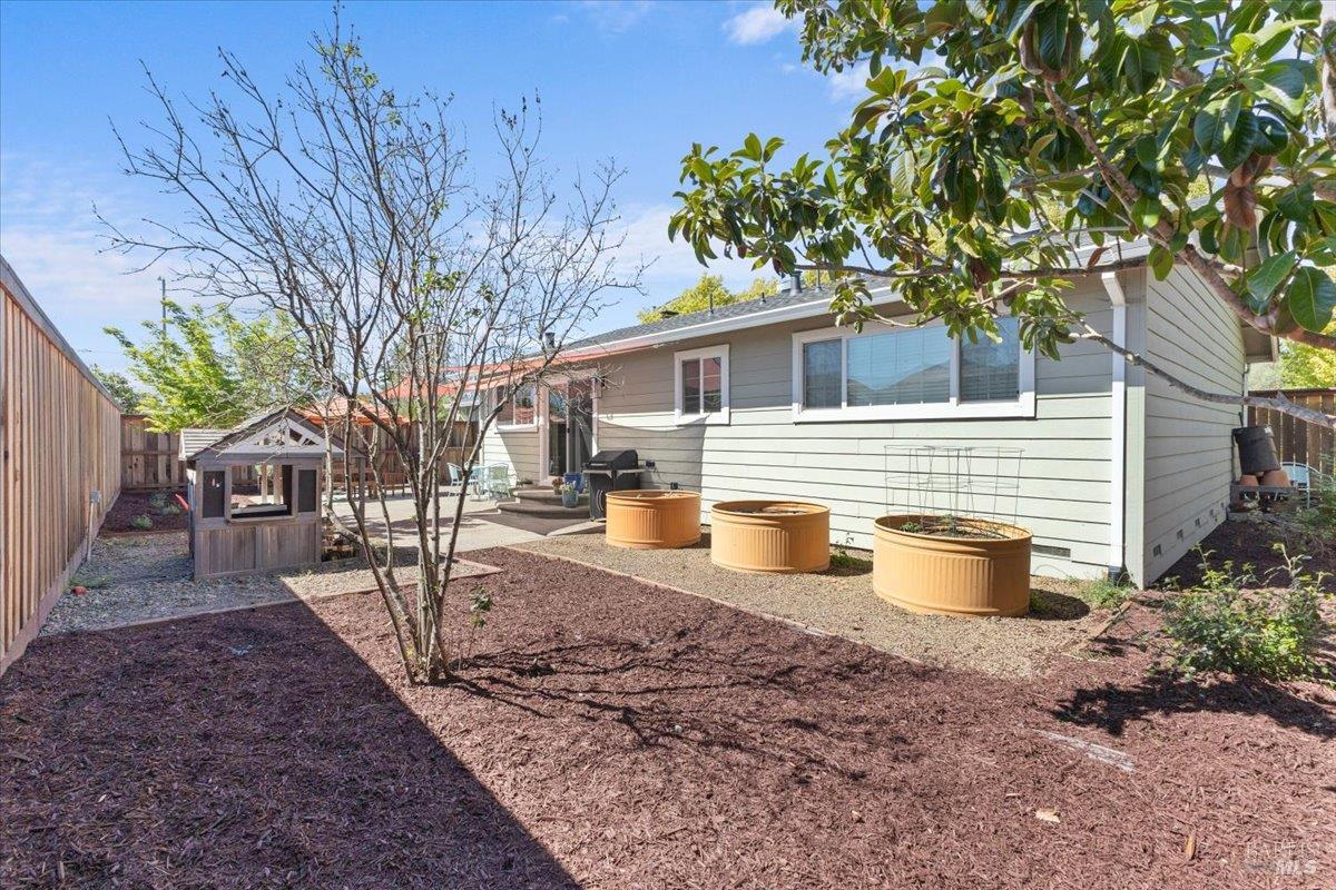 6900 Montecito Boulevard Santa Rosa, CA 95409 - Photo 23 of 25 a front view of a house with yard and seating area
