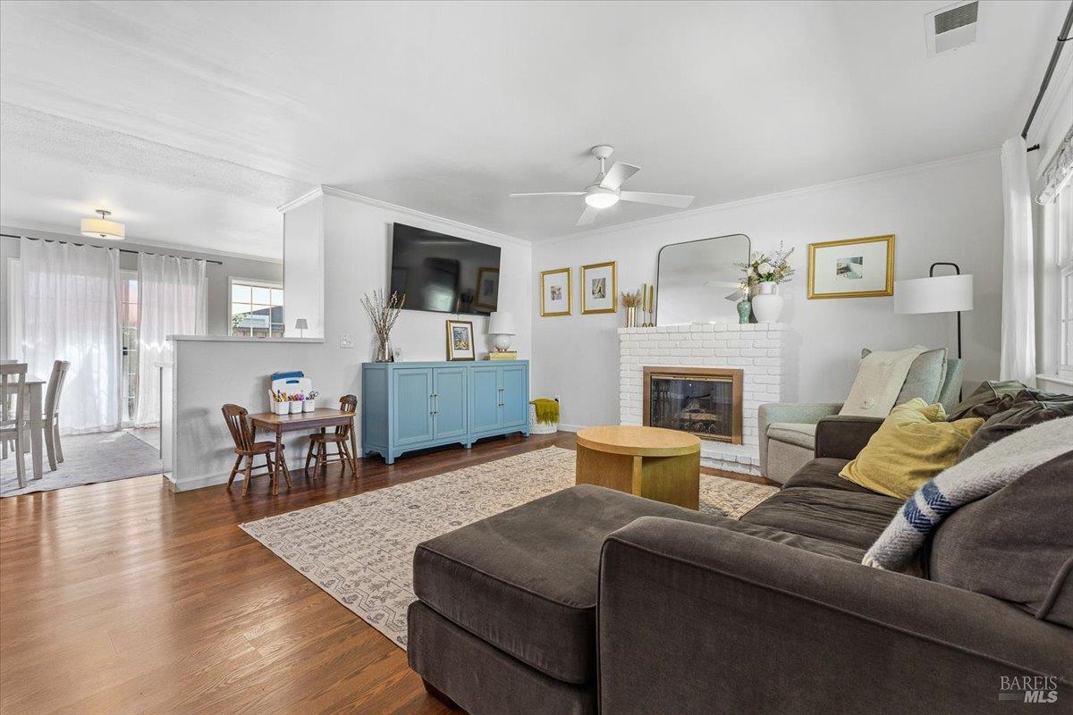 6900 Montecito Boulevard Santa Rosa, CA 95409 - Photo 4 of 25 a living room with furniture fireplace and a flat screen tv
