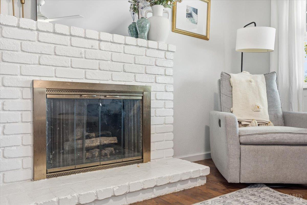 6900 Montecito Boulevard Santa Rosa, CA 95409 - Photo 6 of 25 a living room with furniture and a fireplace