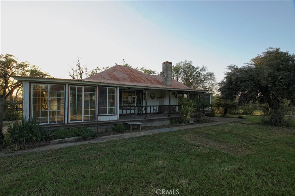 15385 Weston Road Corning, CA 96021 - Photo 3 of 75 a view of a house with a yard and sitting area