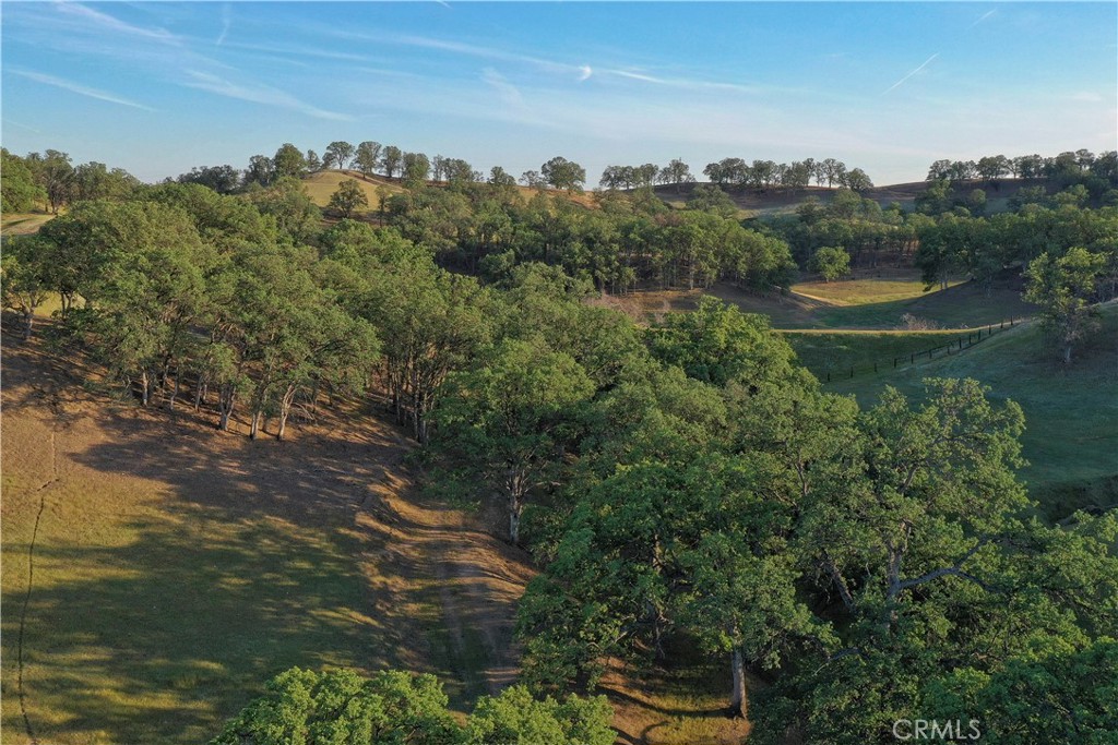 15385 Weston Road Corning, CA 96021 - Photo 33 of 75 a view of a lake with a mountain in the background