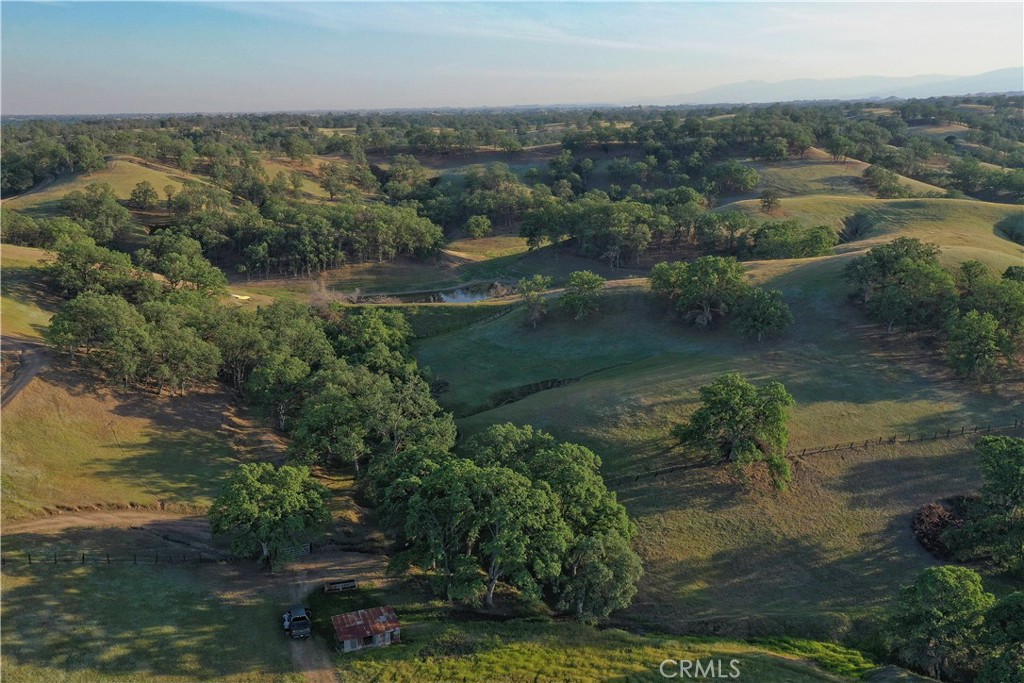 15385 Weston Road Corning, CA 96021 - Photo 35 of 75 an aerial view of residential houses with outdoor space and river