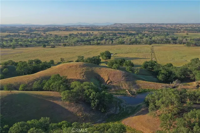 a living room with furniture a chandelier