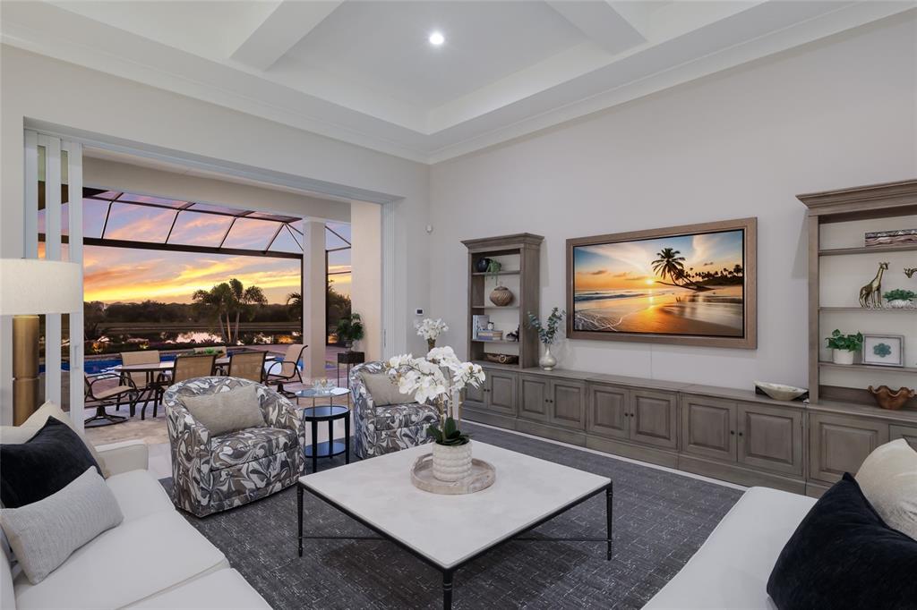 7923 Bowspirit Way Lakewood Ranch, FL 34202 - Photo 11 of 82 a living room with furniture and a flat screen tv