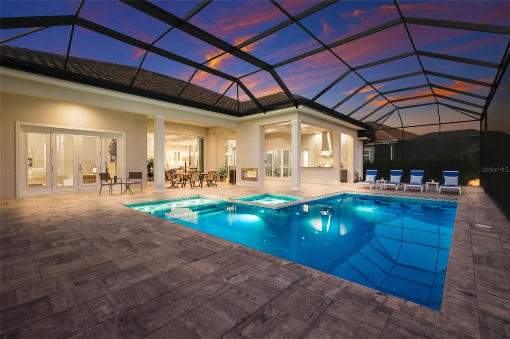 7923 Bowspirit Way Lakewood Ranch, FL 34202 - Photo 54 of 82 a view of a swimming pool with a patio