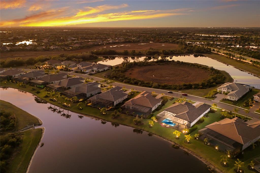 7923 Bowspirit Way Lakewood Ranch, FL 34202 - Photo 63 of 82 an aerial view of residential houses with outdoor space