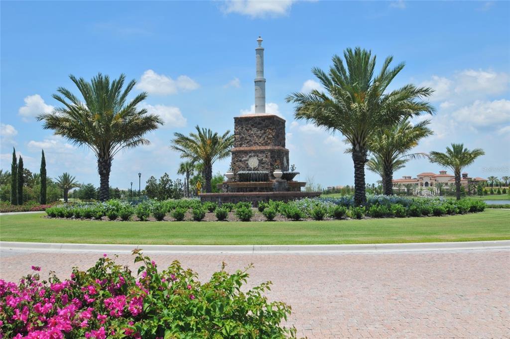 7923 Bowspirit Way Lakewood Ranch, FL 34202 - Photo 82 of 82 a front view of multi story residential apartment building with yard and green space