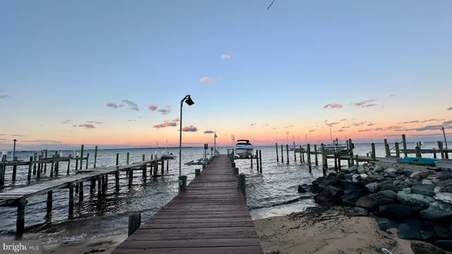 a view of a balcony with wooden floor
