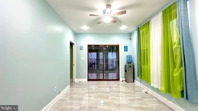 a view of a hallway with a chandelier