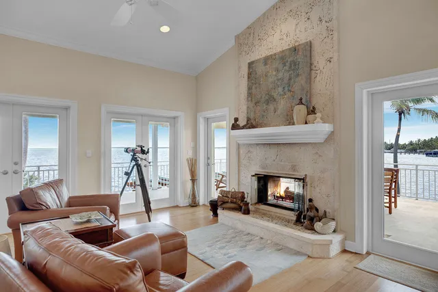 a kitchen with granite countertop a sink and stainless steel appliances