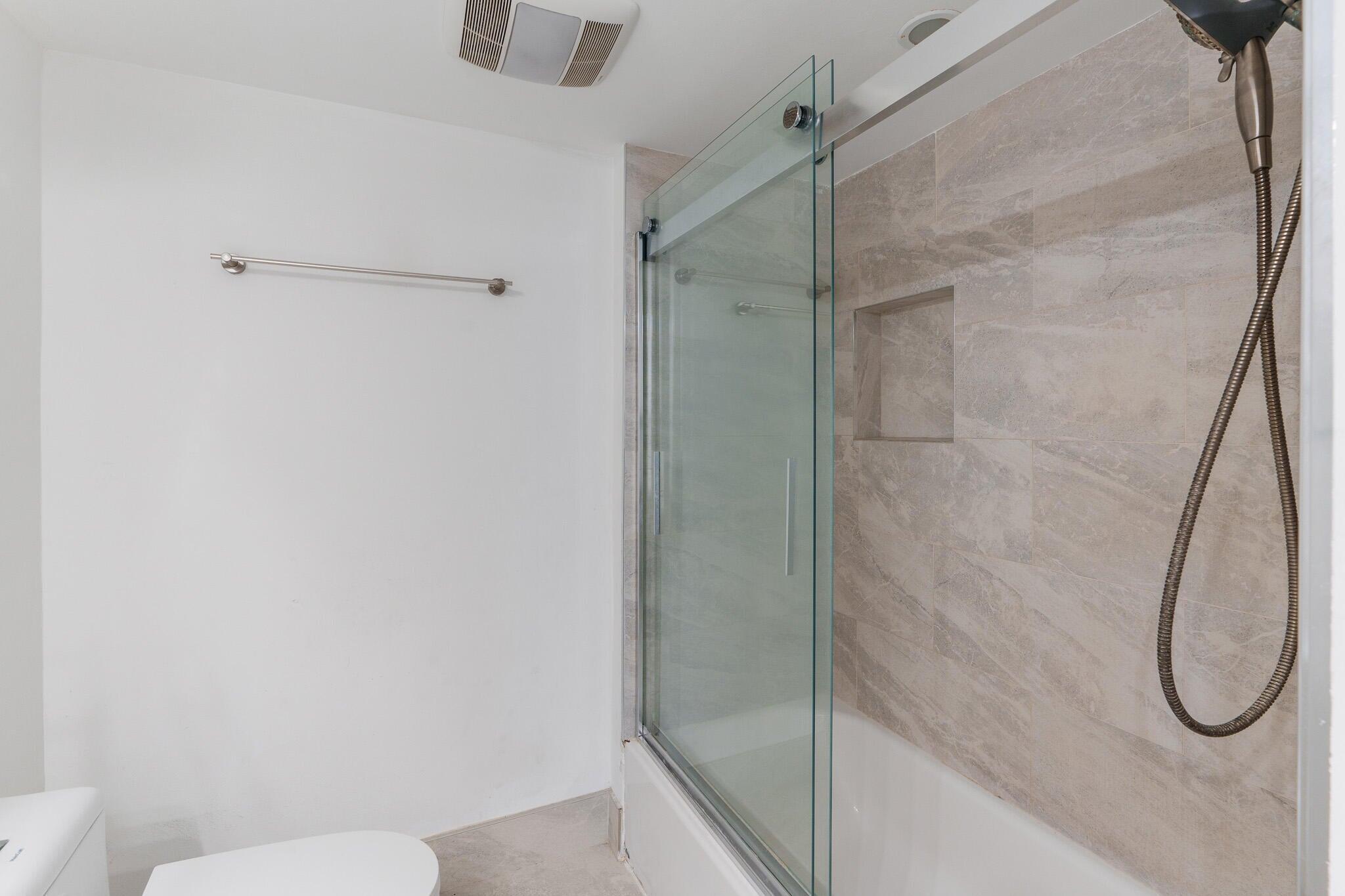 951 De Soto Road, Unit 130 Boca Raton, FL 33432 - Photo 21 of 38 a bathroom with a shower
