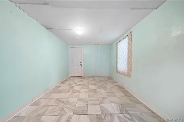 $599,000 | 68 South Village Drive, Bellport, NY 11713