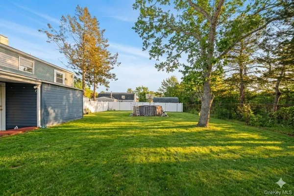 $599,000 | 68 South Village Drive, Bellport, NY 11713