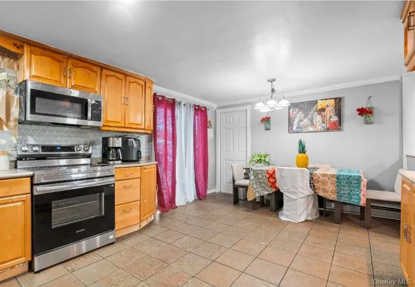 $599,000 | 68 South Village Drive, Bellport, NY 11713