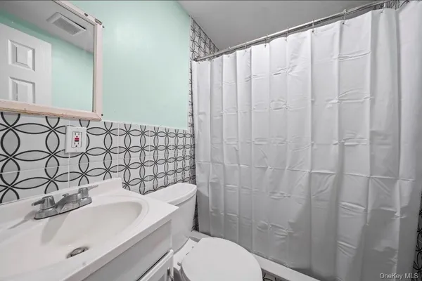 $599,000 | 68 South Village Drive, Bellport, NY 11713