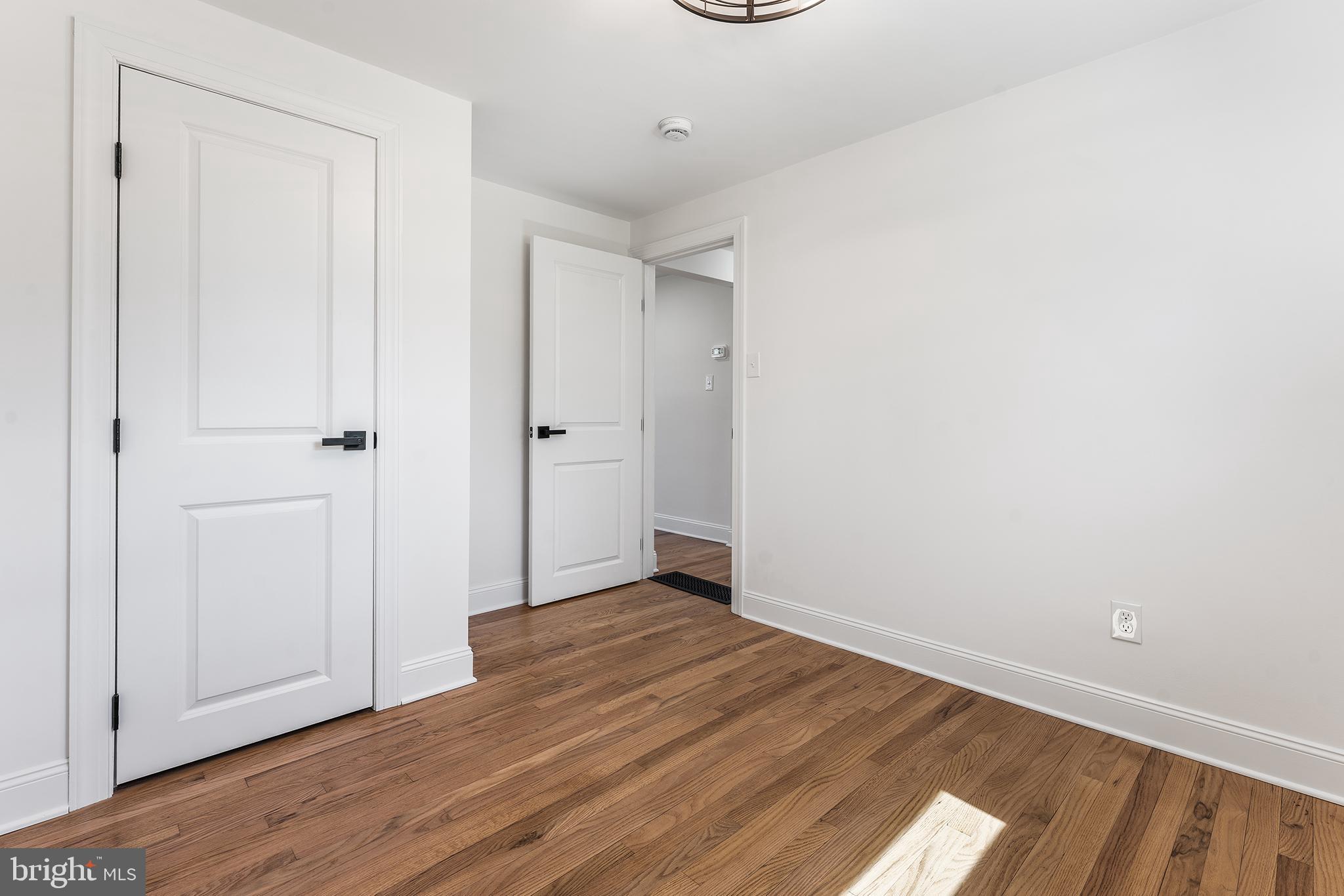 546 Heiser Road Collegeville, PA 19426 - Photo 15 of 30 an empty room with wooden floor