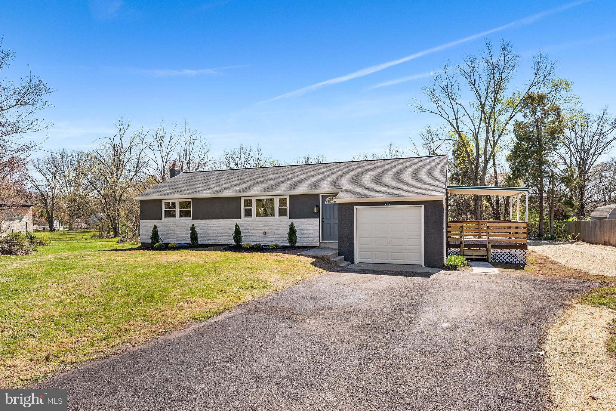 546 Heiser Road Collegeville, PA 19426 - Photo 2 of 30 a front view of a house with a yard and garage