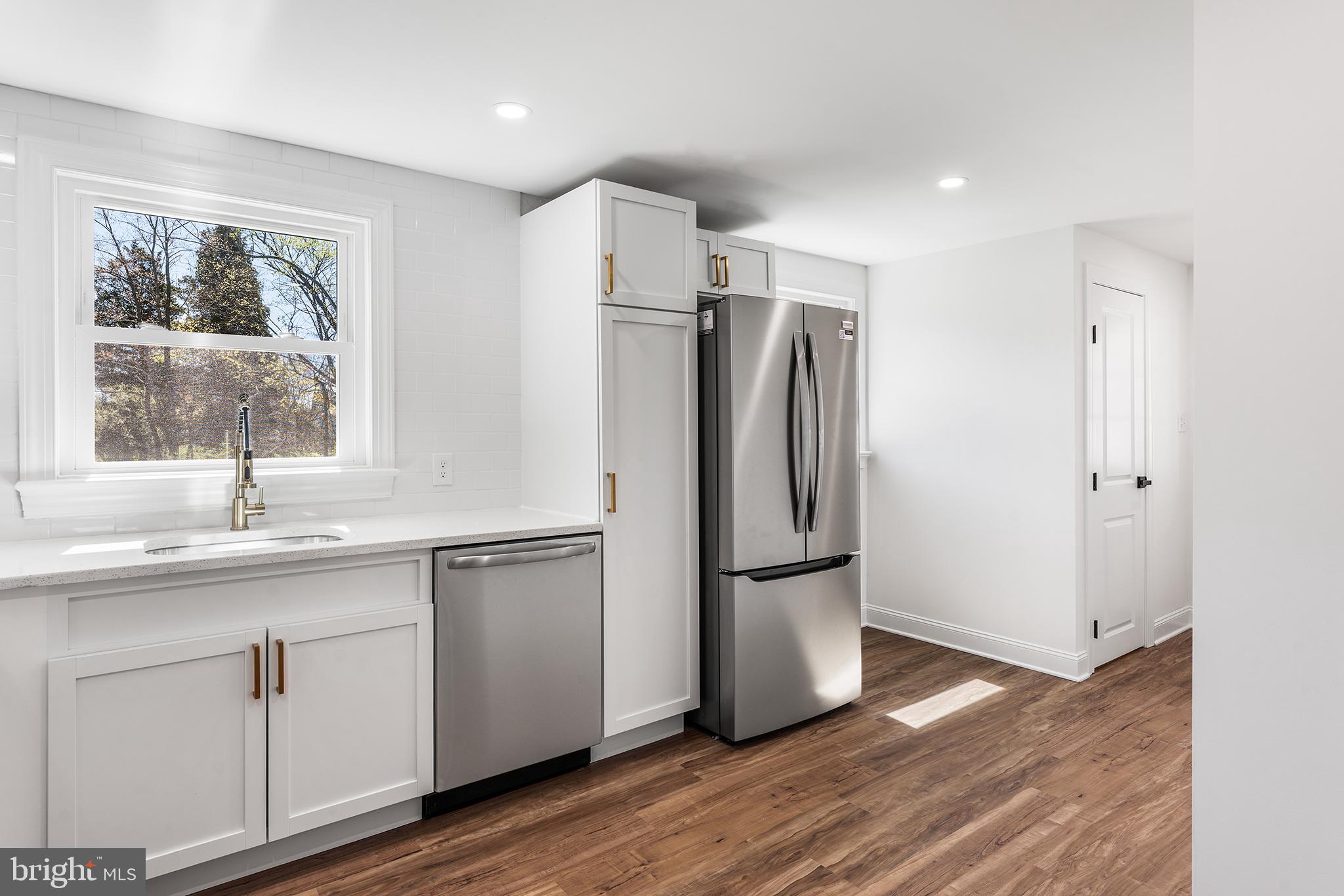 546 Heiser Road Collegeville, PA 19426 - Photo 6 of 30 a kitchen with stainless steel appliances a refrigerator and a sink