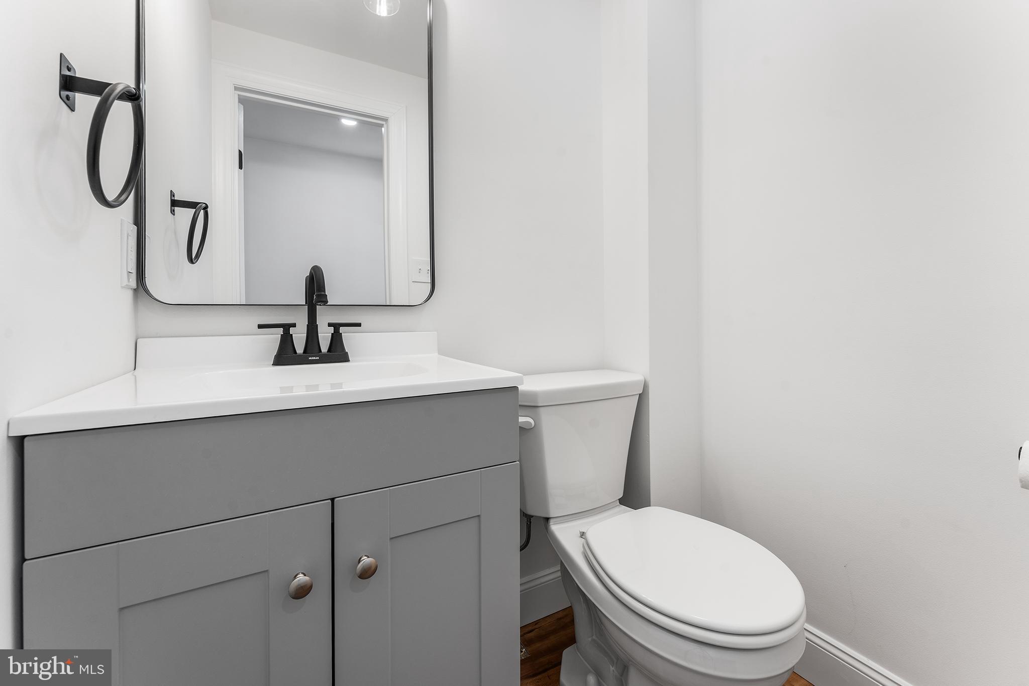 546 Heiser Road Collegeville, PA 19426 - Photo 8 of 30 a bathroom with a toilet sink and mirror