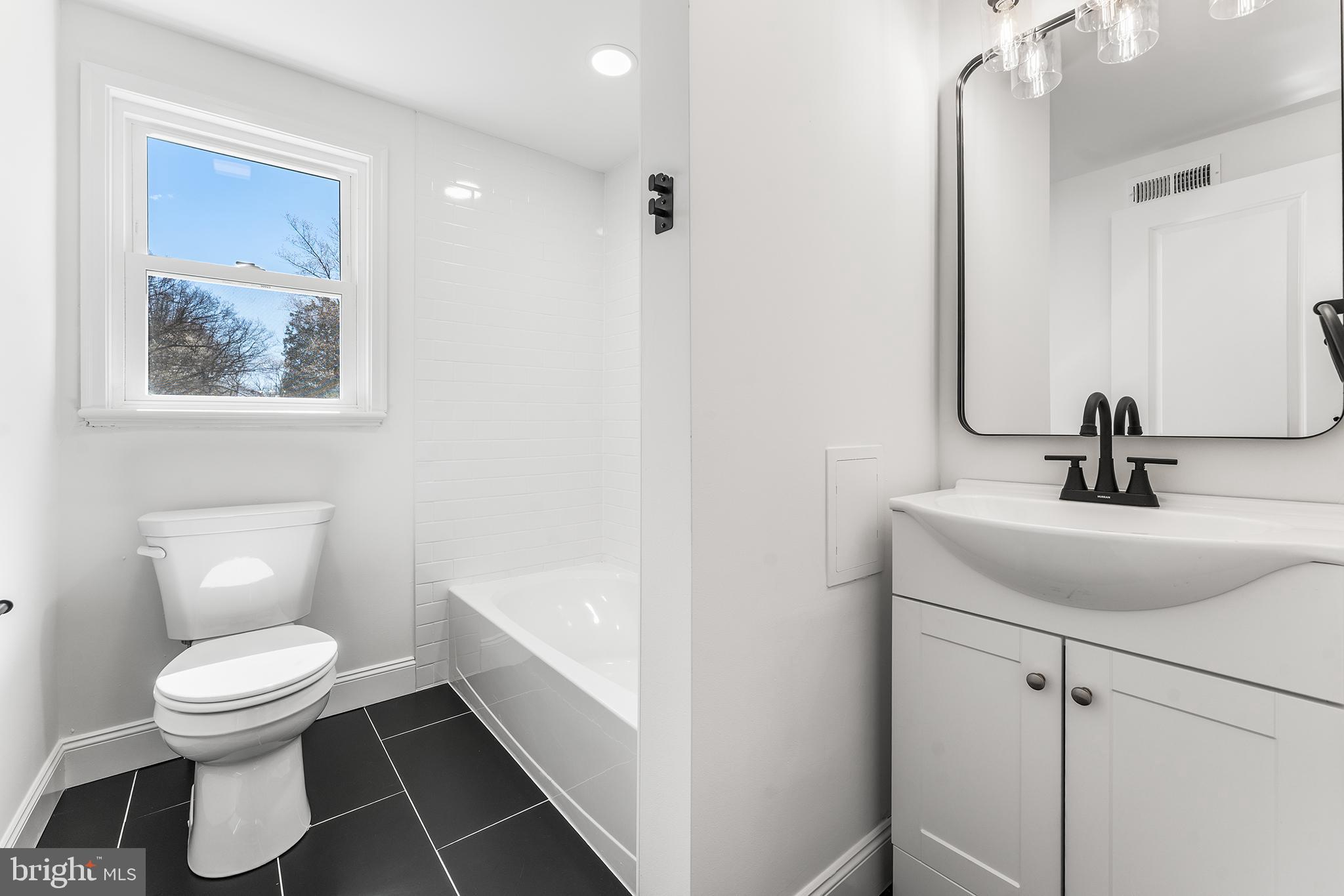 546 Heiser Road Collegeville, PA 19426 - Photo 9 of 30 a bathroom with a toilet sink and mirror