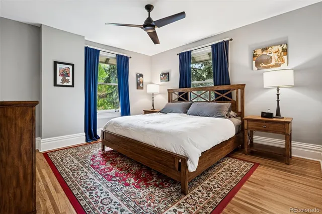 a bedroom with bed and a window