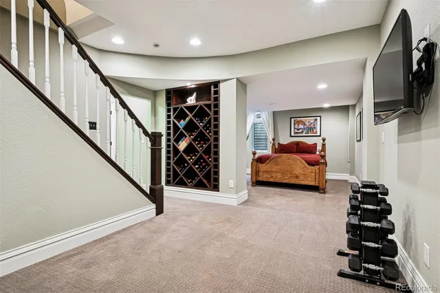 a view of livingroom with furniture and workspace
