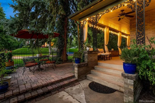a view of a chair and tables in the patio