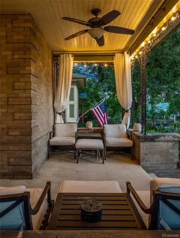 a swimming pool with outdoor seating