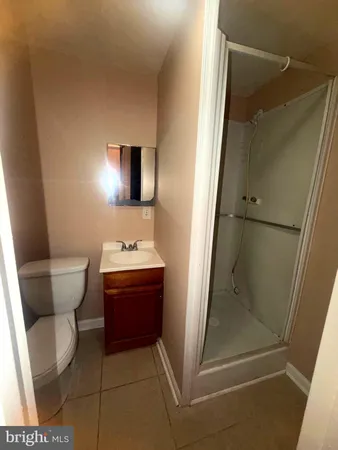 a bathroom with a toilet and a sink