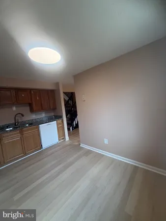a view of a kitchen with a sink