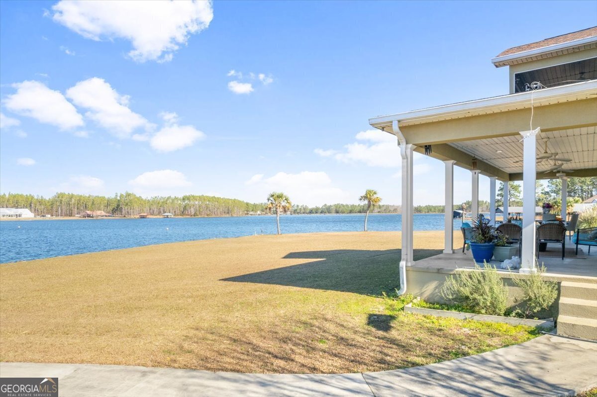 201 Miles Road Bristol, GA 31518 - Photo 42 of 69 a view of a swimming pool and an ocean